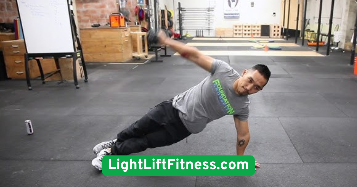 Dumbbell Side Plank Raises