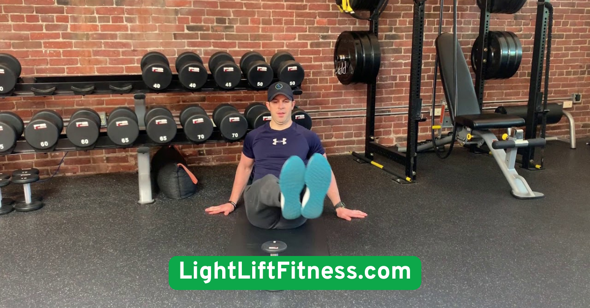 Seated Leg Lifts with Dumbbell